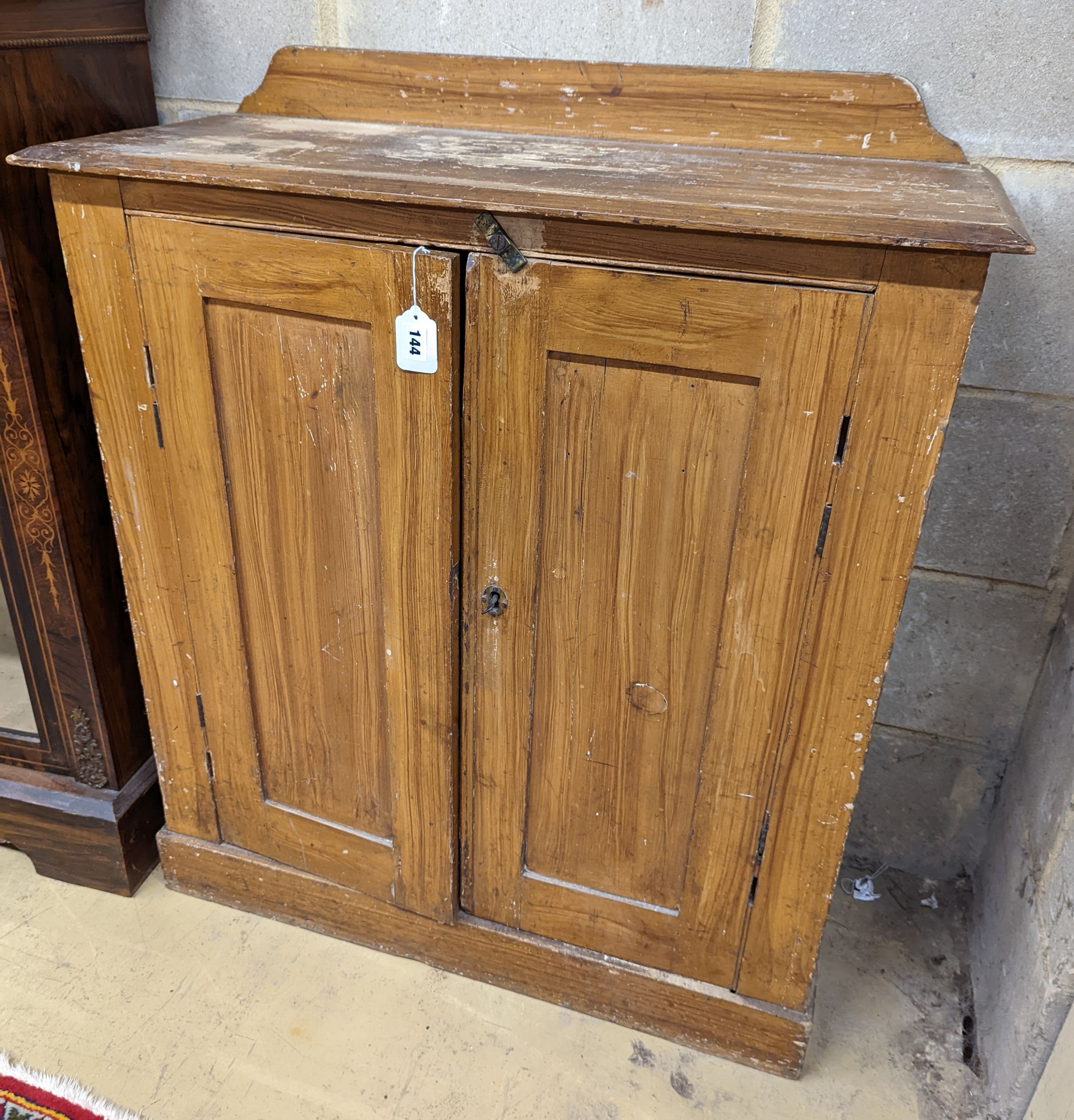 A Victorian small scumbled pine hall cabinet with painted simulated grain, width 84cm, depth 34cm, height 97cm